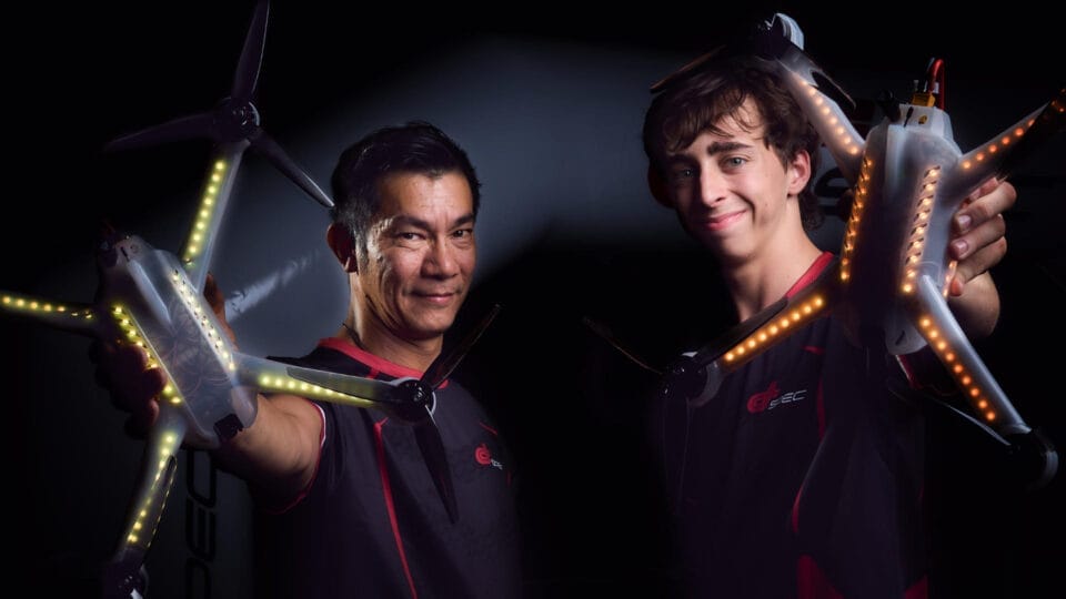 2 drone pilots for DSpec racing showing their racing drones
